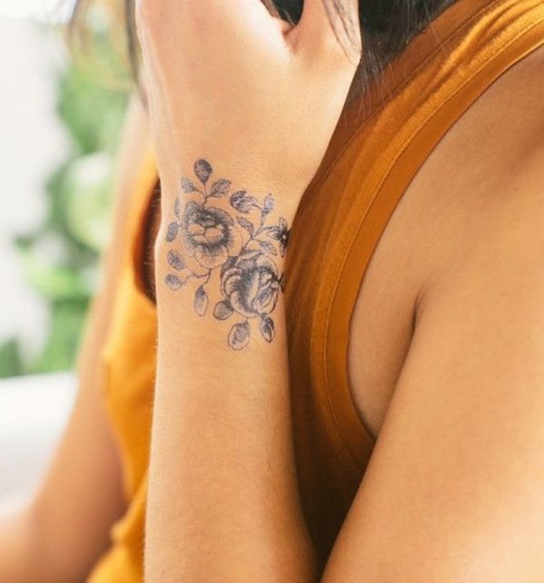 Enthralling Wrist Blooms Tattoo