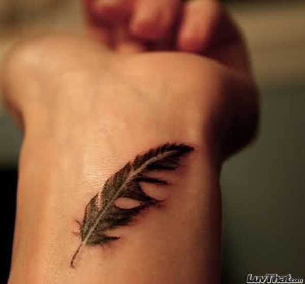 Fantastic Feather Tattoo On Wrist