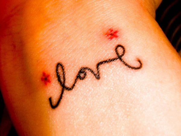Fantastic Love Tattoo On Wrist
