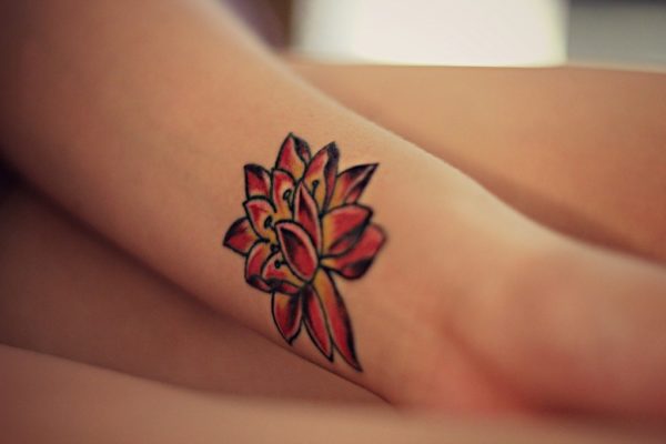 Feminine Flower Tattoo On Wrist