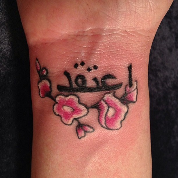 Flower And Arabic  Tattoo