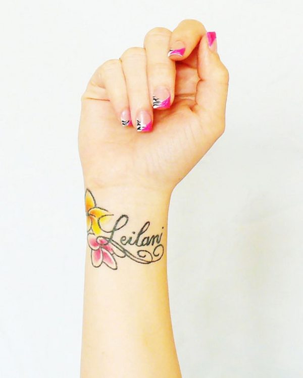 Flower And Word Tattoo On Wrist