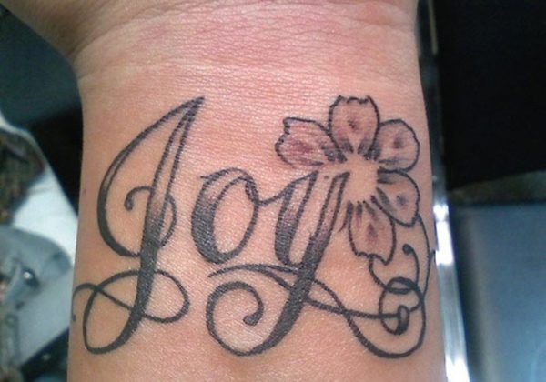 Flower Joy Wrist Tattoo