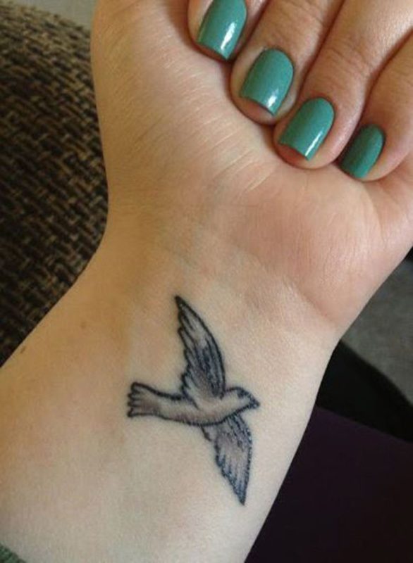 Flying Bird Tattoo