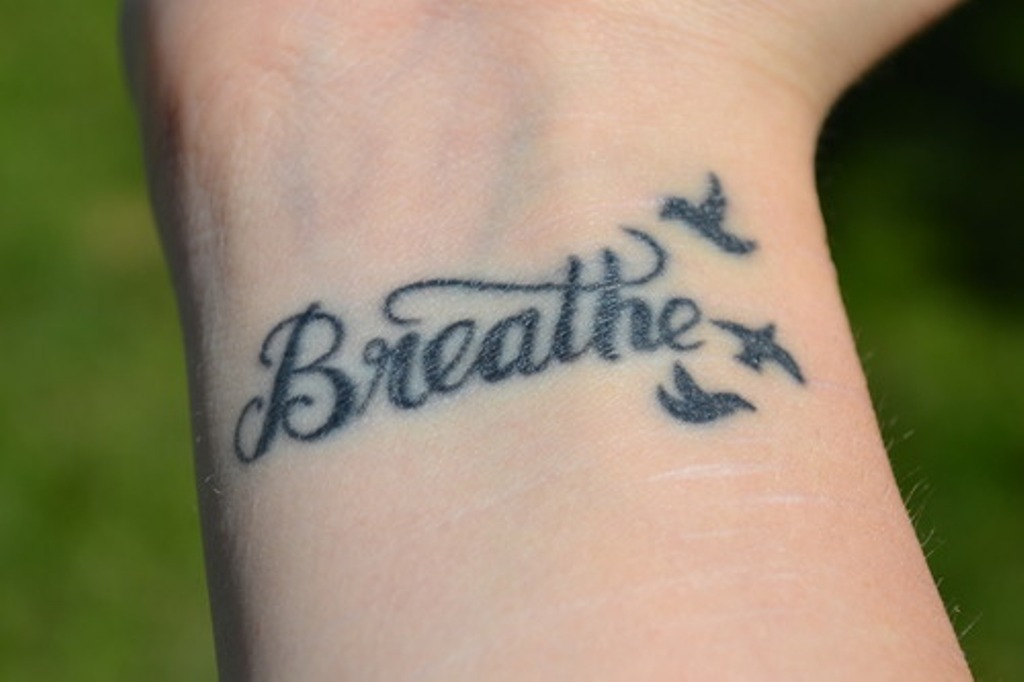 54 Elegant Just Breathe Tattoos Design On Wrist.