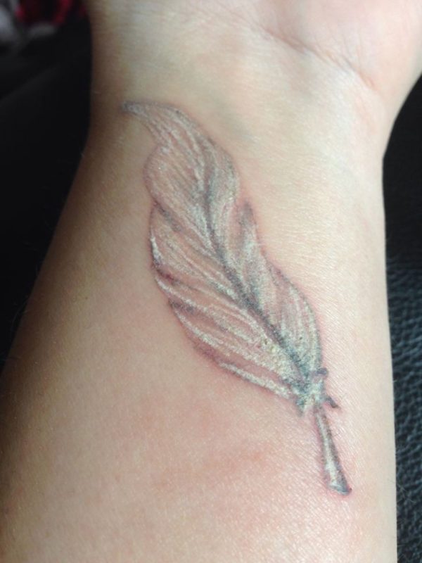 Graceful Feather Tattoo On Wrist