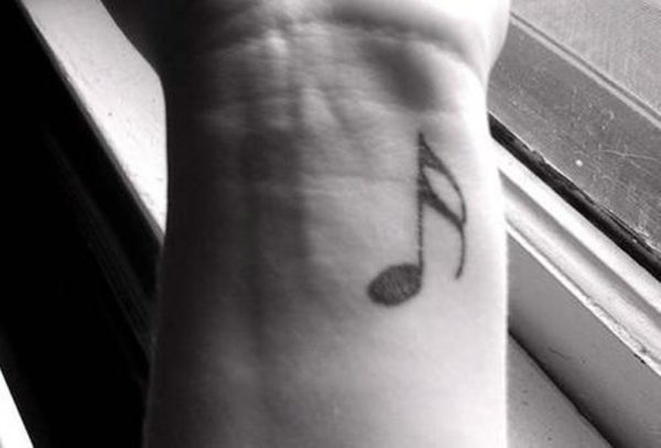 Graceful Music Note Tattoo