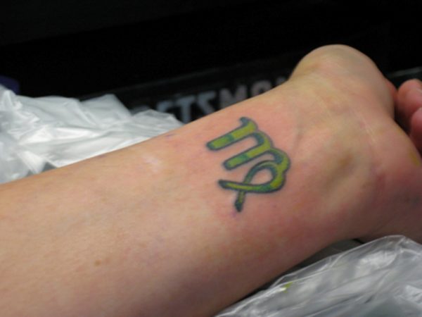 Green Zodiac Sign Tattoo
