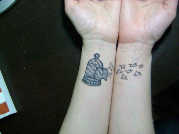 Grey Ink Cage And Birds Tattoo