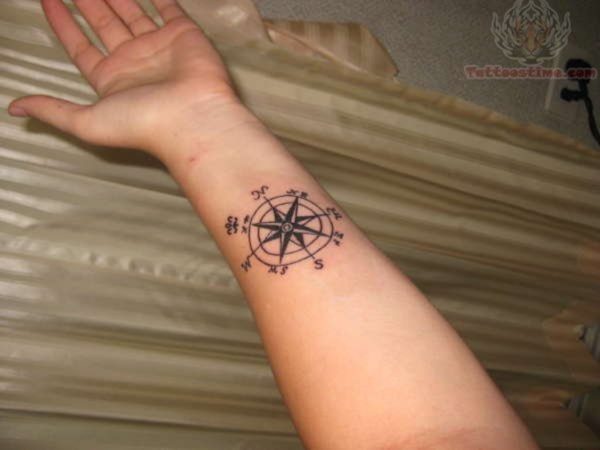 Grey Ink Compass Tattoo