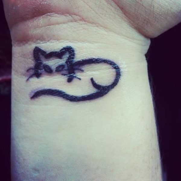 Half  Cat Tattoo On Wrist