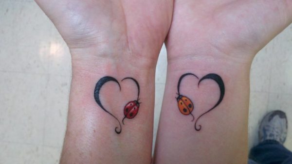 Heart And Glow wom Tattoo