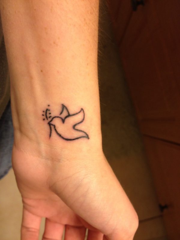 Impressive Dove Tattoo On Wrist