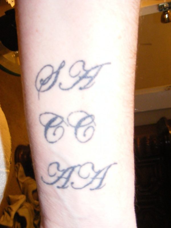 Initials Tattoo On Wrist