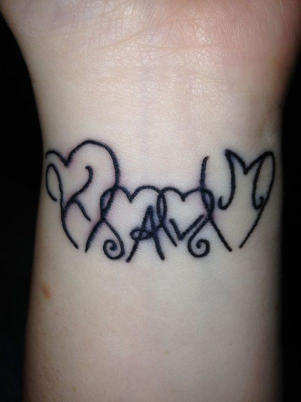 Initials heart Tattoo On Wrist