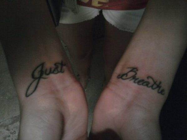 Just Breathe Wording Tattoo On Wrist 