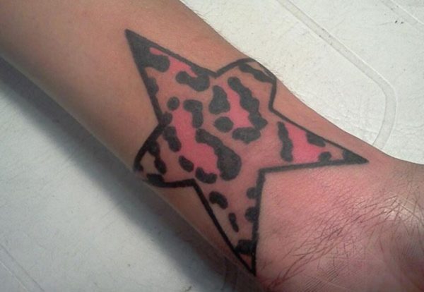 Leopard Star Tattoo On Wrist