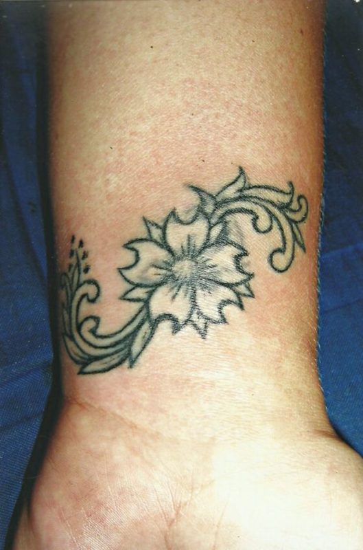 Little Wrist Flower Tattoo
