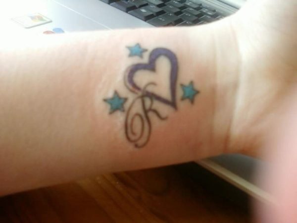 Love And Star  Tattoo On Wrist