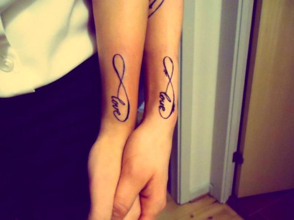 Love Word Tattoo Design On Wrist 