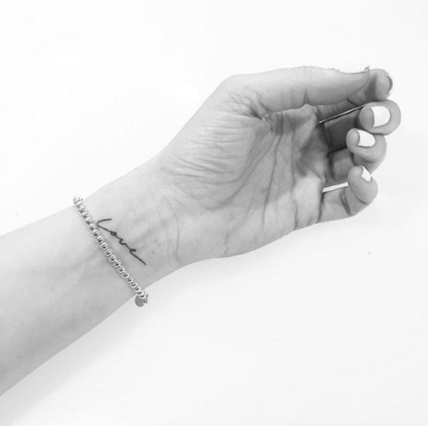 Love Wrist Tattoo