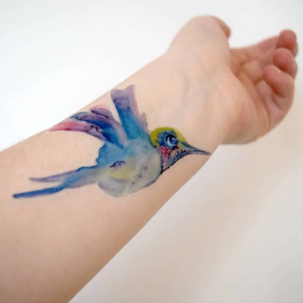 Lovely Watercolor Bird Tattoo On Wrist