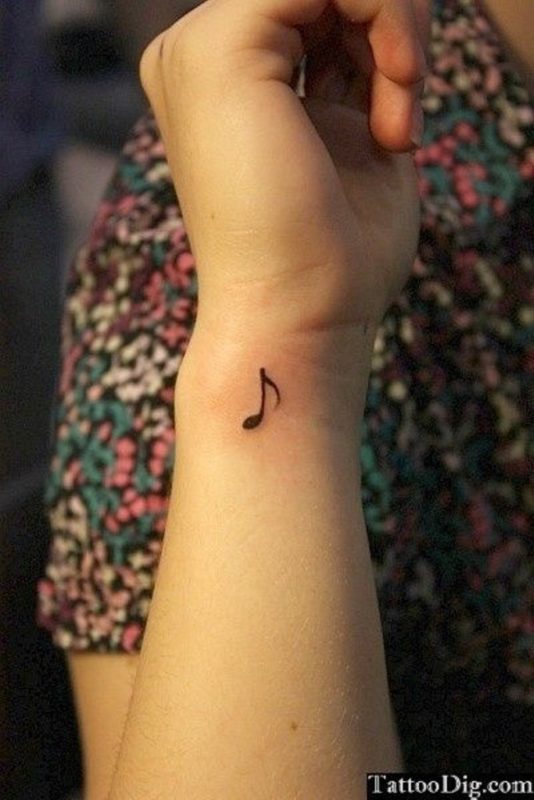 Music Word Tattoo Design On Wrist 