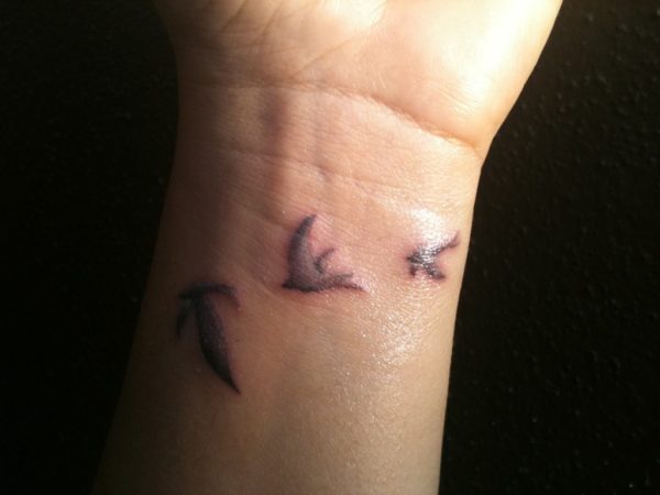 Nice Birds Tattoo Design 