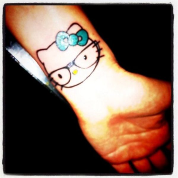 Nice kitty Wrist Tattoo