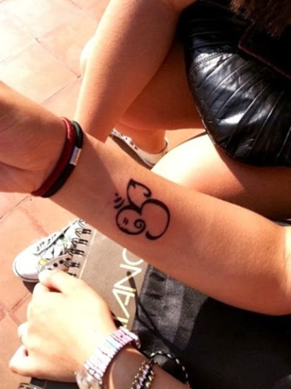 Om Tattoo Design On Wrist