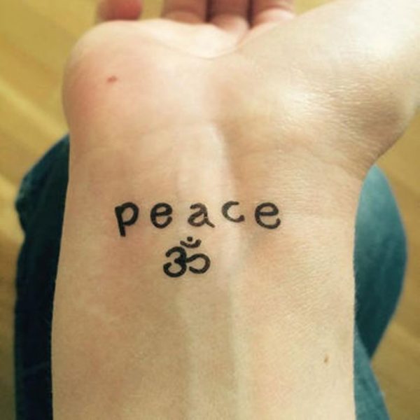 Om Tattoo On Wrist