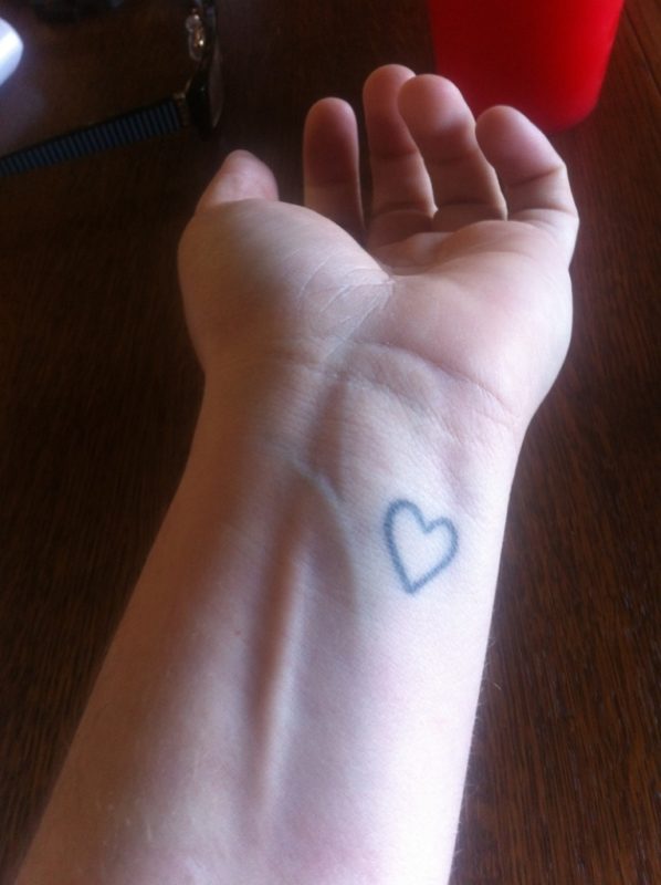 Outline Black Heart Tattoo On Wrist