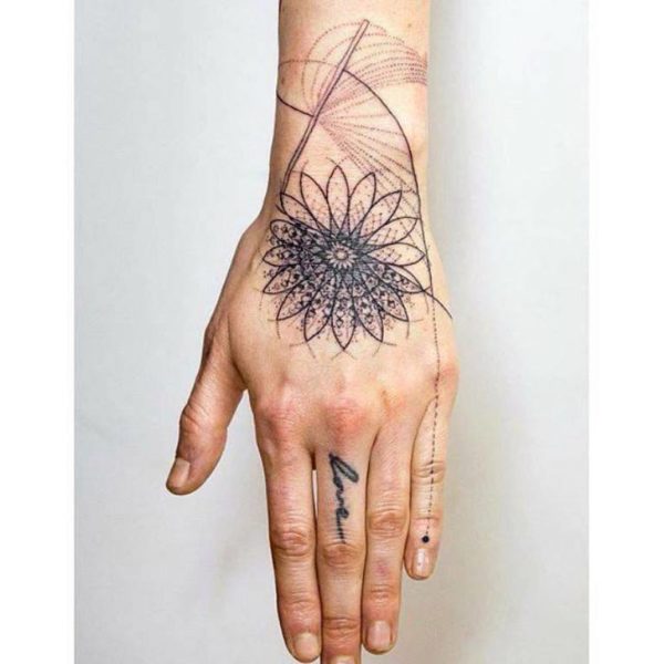 Outline Flower Tattoo On Wrist