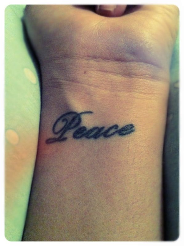 Peace Word Tattoo On Wrist