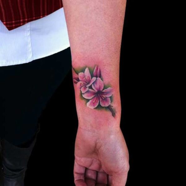 Pink Flower Tattoo On Wrist