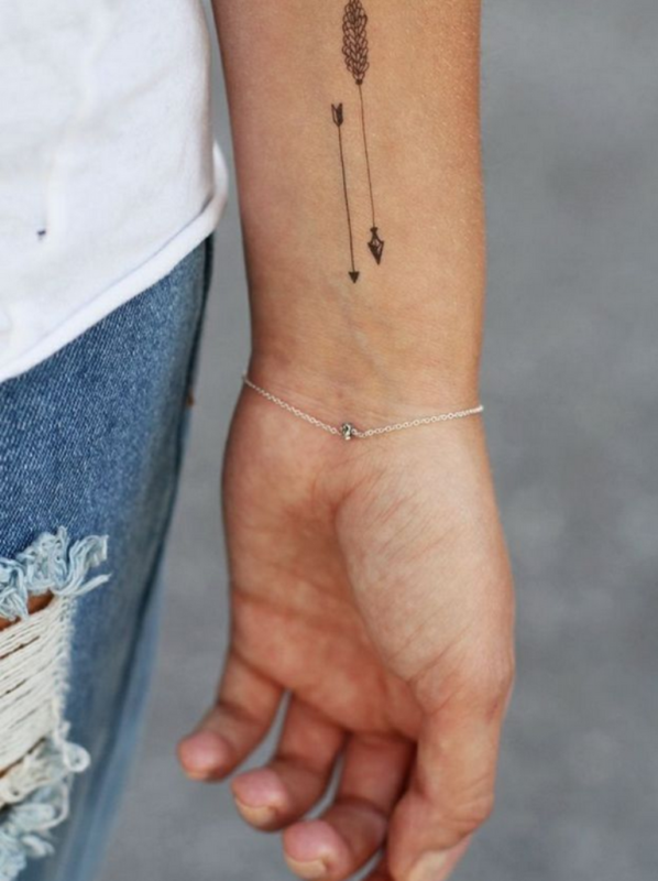 Pretty Slim Arrow Wrist Tattoo