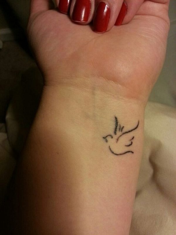 Pretty Small Dove Tattoo On Wrist