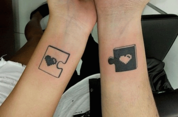 Puzzle Love Tattoo On Wrist