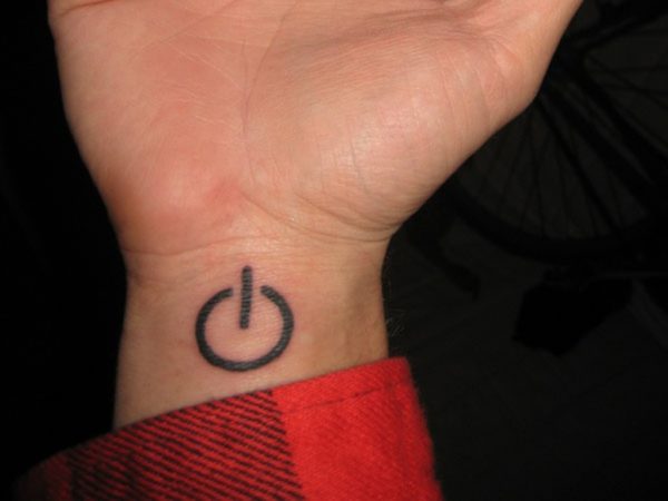 Quit symbol Tattoo On Wrist