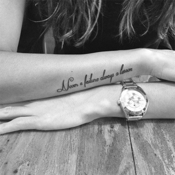 Quotes vertical Tattoo On Wrist