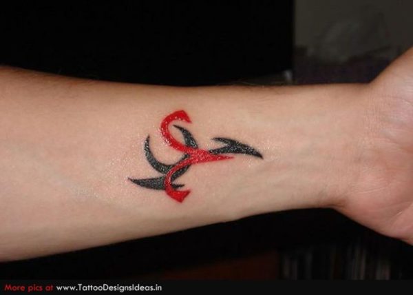 Red Ink Aries Tattoo