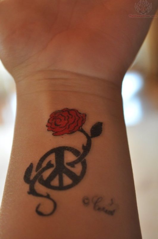 Red Roses And Peace Tattoos On Wrist