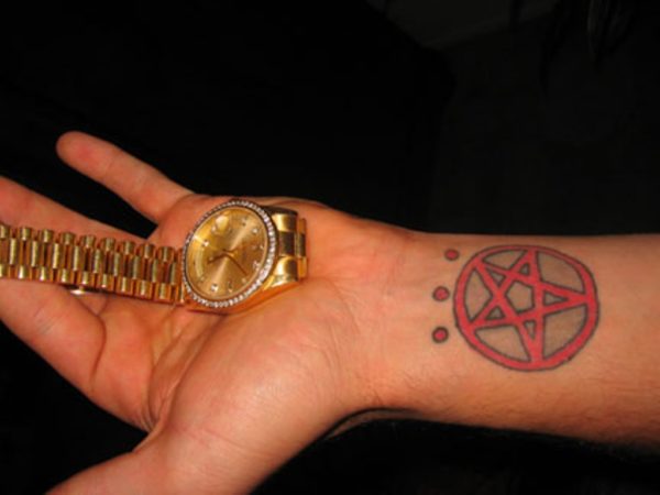 Red Star Tattoo On Wrist