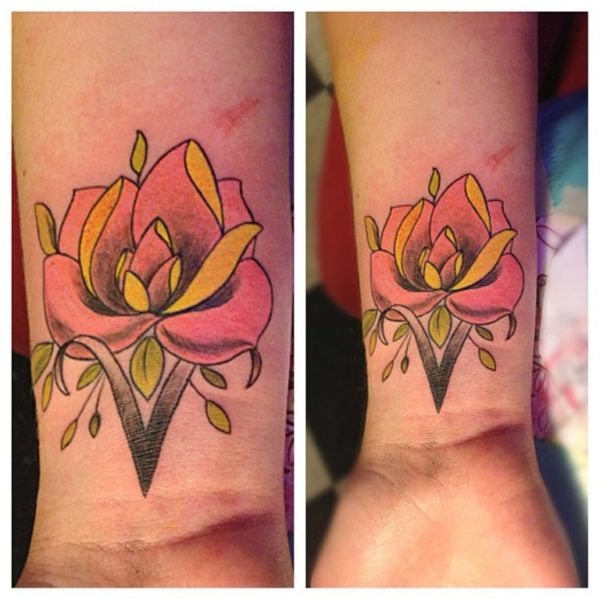 Rose And Aries Sign Tattoo On Wrist