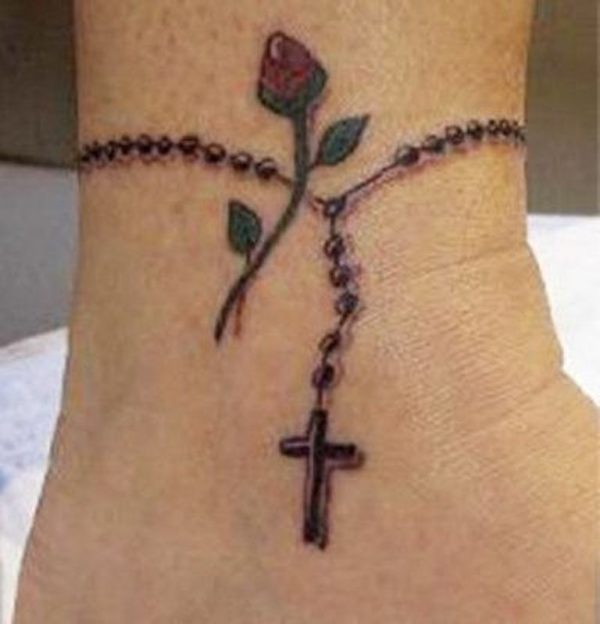 Rose And Rosary Tattoo On Wrist