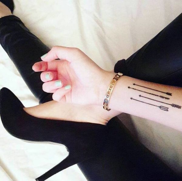 Sharp Arrows Tattoo On Wrist