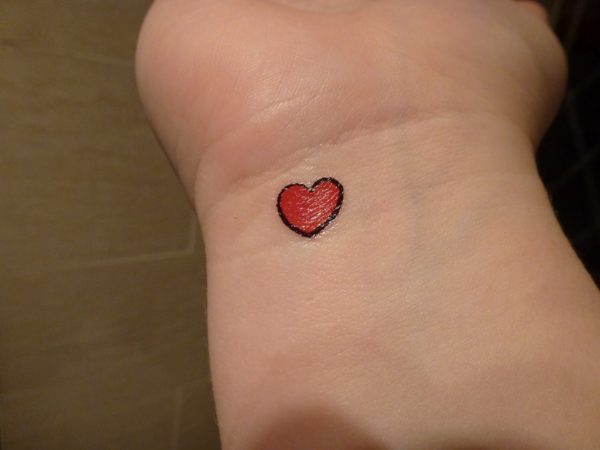 Shinning Red Heart Tattoo