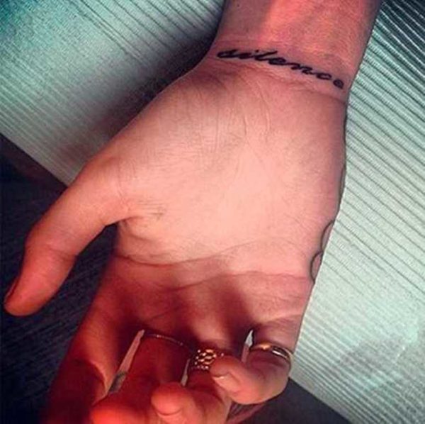 Silence Tattoo On Wrist