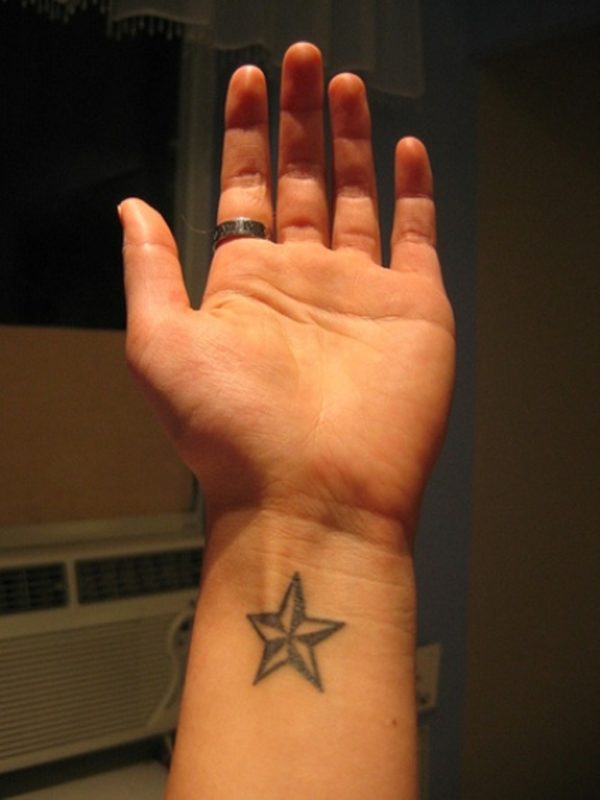 Single Star Tattoo On Wrist