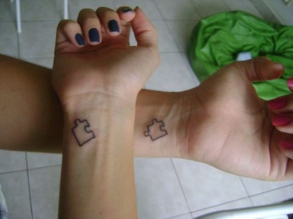 Sister Have Matching Puzzle Tattoo On Wrist